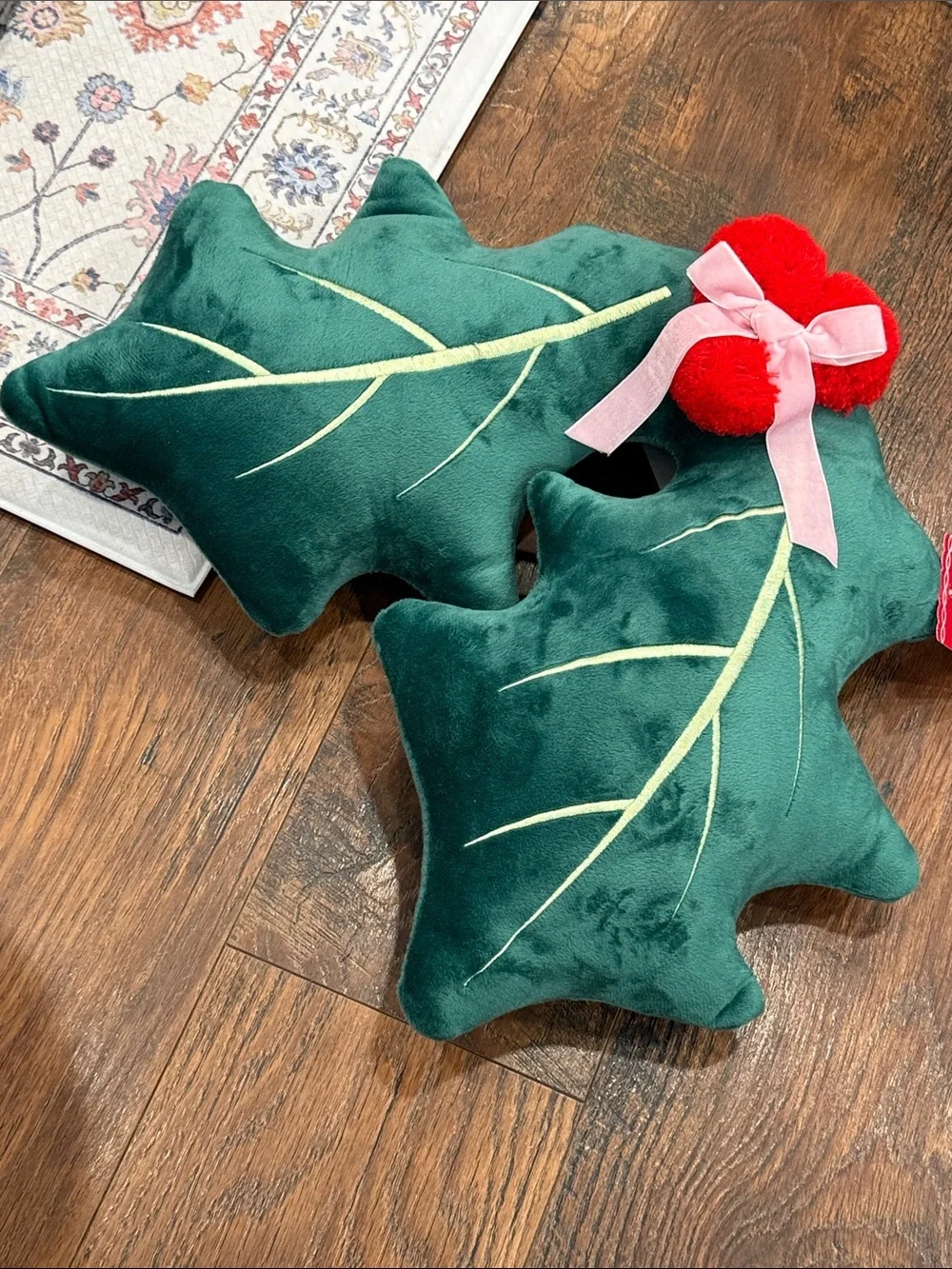 Green Holly Leaf Throw Pillow Pair with Red Pom Accents